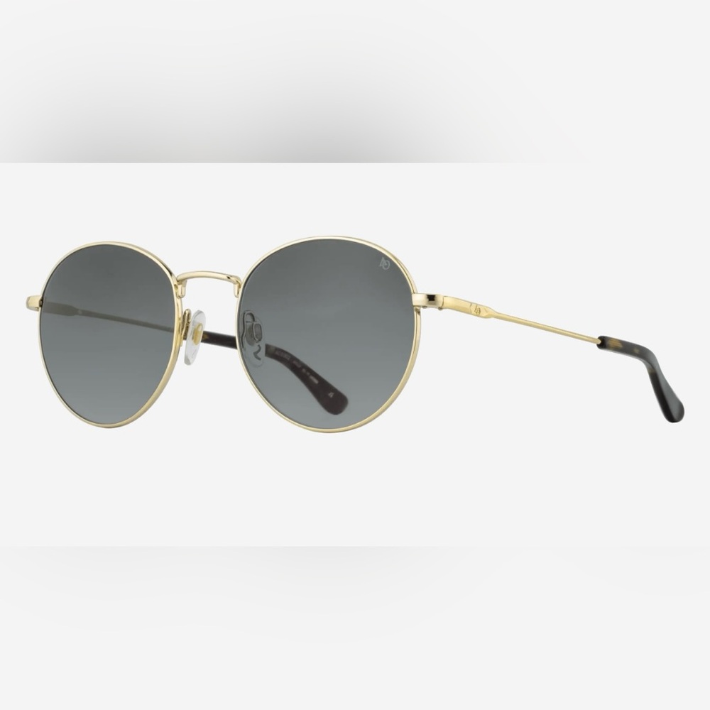 New American Optical AO1002 polarized sunglasses in gold with gray lenses. AO